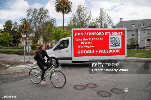 SumOfUs drives a truck through the Stanford University campus urging Stanford students to join a pledge to boycott working at Facebook or Google on...