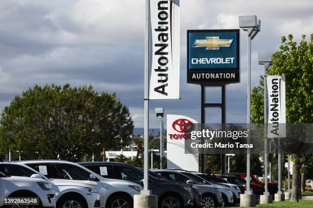 AutoNation signs are displayed at an AutoNation Chevrolet car dealership on April 21, 2022 in Valencia, California. The auto retailer released...