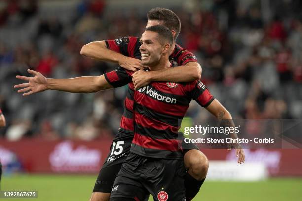 Jack Rodwell of the Wanderers celebrates with team mates after scoring a goal during the A-League Mens match between Western Sydney Wanderers and...