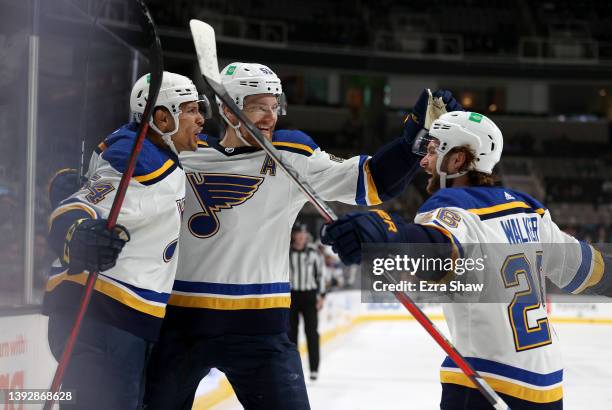 Dakota Joshua of the St. Louis Blues is congratulated by Colton Parayko and Nathan Walker after he scored a goal against the San Jose Sharks in the...