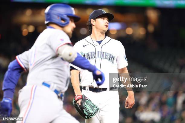 Marco Gonzales of the Seattle Mariners reacts after giving up a double to Nathaniel Lowe of the Texas Rangers during the fifth inning at T-Mobile...