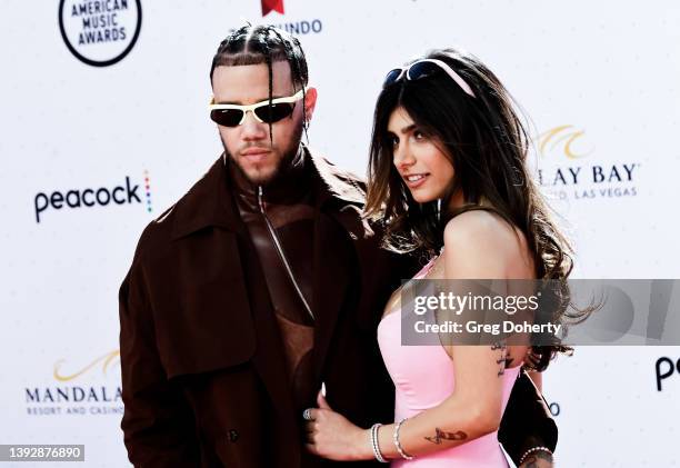 Jhay Cortez and Mia Khalifa arrive at the 2022 Latin American Music Awards at Michelob ULTRA Arena on April 21, 2022 in Las Vegas, Nevada.