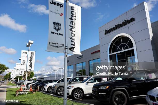 Vehicles are displayed for sale at an AutoNation car dealership on April 21, 2022 in Valencia, California. The auto retailer released quarterly...