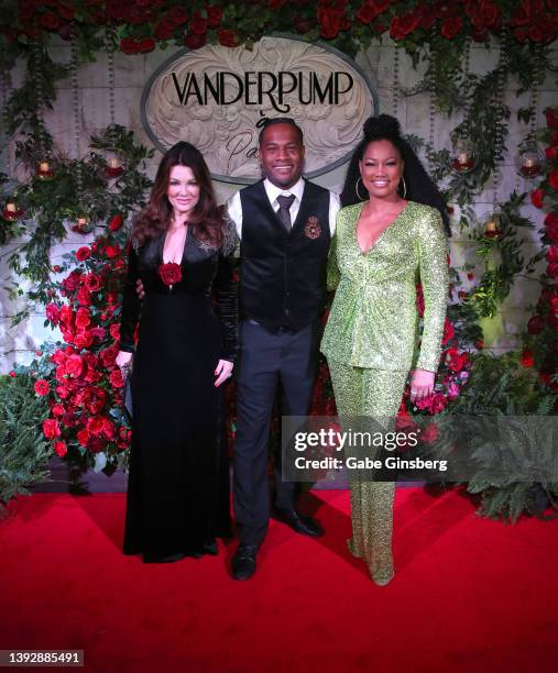 Television personalities Lisa Vanderpump, Oliver Saunders, and Garcelle Beauvais attend Vanderpump's grand opening of Vanderpump à Paris at Paris Las...