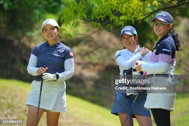 Yu Tajima, Eriko Kobashi and Kotono Kozuma of Japan smile on the 6th tee during the second round of KCFG Ladies Madonoume Cup at Takeo Golf Club on...