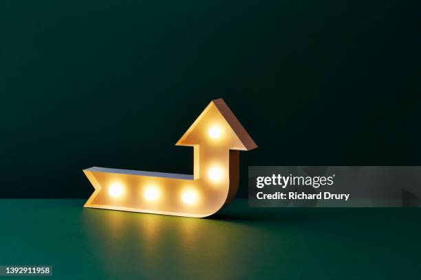 an arrow points up - success stock pictures, royalty-free photos & images