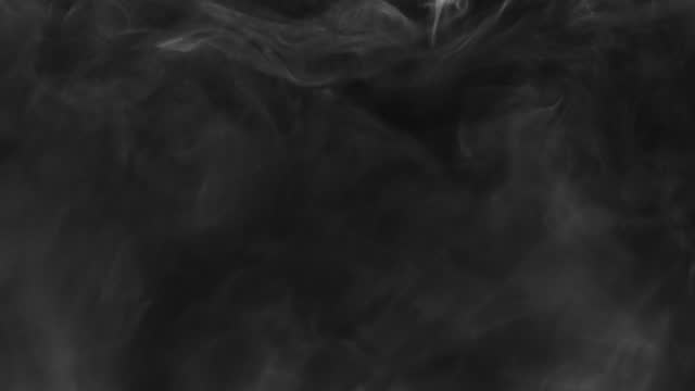A black background with a scattered flowing white smoke