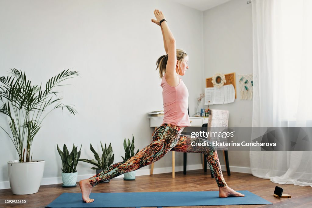 A woman is engaged in home fitness