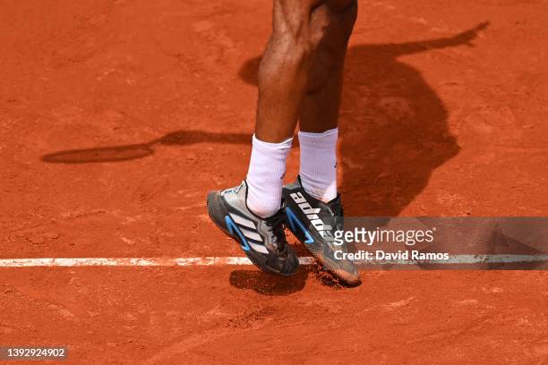 Detailed view of the shoes of Felix Auger-Aliassime of Canada as he serves in their third round match against Frances Tiafoe of United States during...