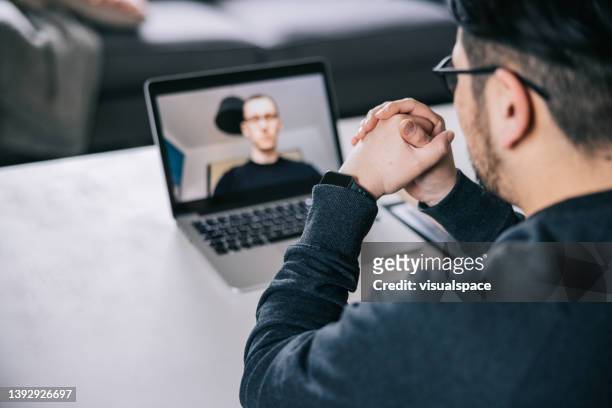 therapist making a video call with patient - meeting silence stock pictures, royalty-free photos & images
