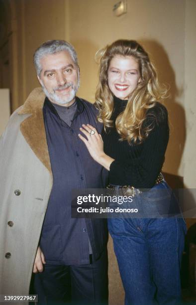 Ingrid Seynhaeve, designer Paco Rabanne's top model, with the designer.