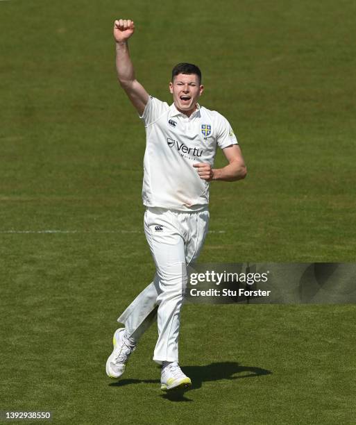 Durham bowler Matthew Potts celebrates after taking the wicket of Joe Clarke during day two of the LV= Insurance County Championship match between...