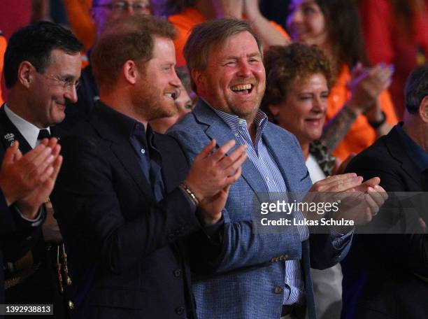 Prince Harry, Duke of Sussex and King of The Netherlands, Willem-Alexander Claus George Ferdinand look on prior to the Gold Medal match between Team...