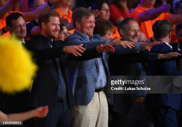 Prince Harry, Duke of Sussex and King of The Netherlands, Willem-Alexander Claus George Ferdinand look on prior to the Gold Medal match between Team...