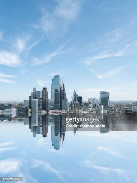 mirror image of london city skyline - digital composite - london tower foto e immagini stock