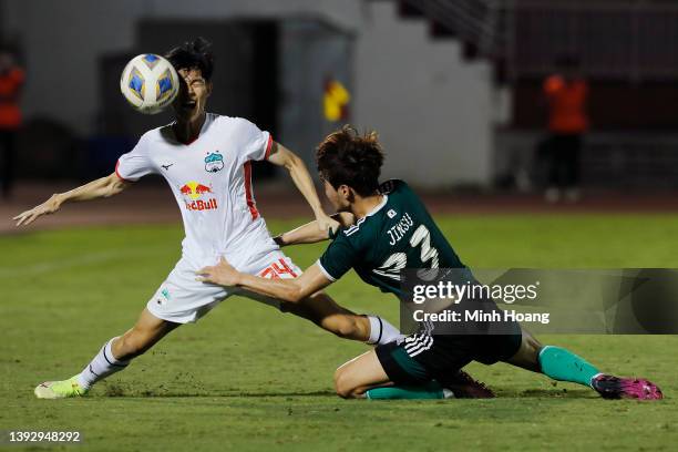 Le Huu Phuoc of Hoang Anh Gia Lai is fouled by Kim Jin-Su of Jeonbuk Hyundai Motors during the second half of the AFC Champions League Group H match...