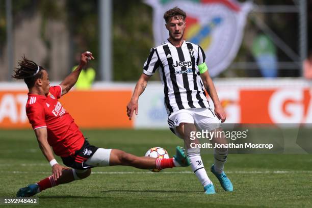 Diego Moreira of SL Benfica challenges Andrea Bonetti of Juventus during the UEFA Youth League 2021/22 Semi-final between Juventus and SL Benfica at...