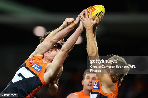 Sam Taylor of the Giants and Nick Haynes of the Giants attempt to mark during the round six AFL match between the Greater Western Sydney Giants and...