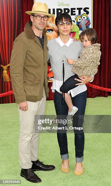 Actor Jason Lee and actress Ceren Alkac with daughter arrive for "The Muppets" Los Angeles Premiere held at the El Capitan Theatre on November 12,...
