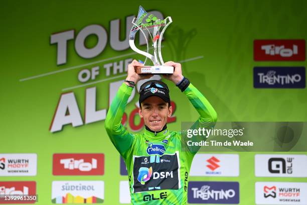 Romain Bardet of France and Team DSM celebrates at podium with race trophy as Green Leader Jersey and final overall winner during the 45th Tour of...