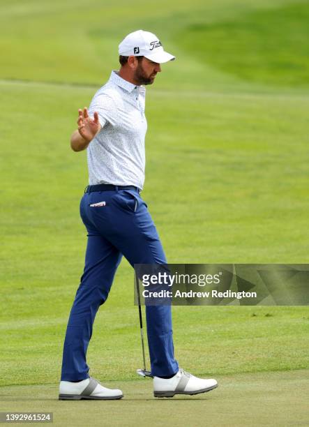 Scott Jamieson of Scotland acknowledges the crowd after making an eagle three on the 18th hole during the second round of the ISPS Handa Championship...