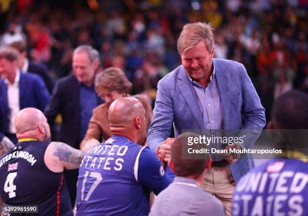 King of The Netherlands, Willem-Alexander Claus George Ferdinand congratulates Gold Medallist Earl Ohligner of Team United States during the medal...