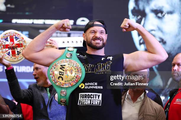 Tyson Fury of Great Britain poses with the WBC belt during the weigh-in ahead of the heavyweight boxing match between Tyson Fury and Dillian Whyte at...