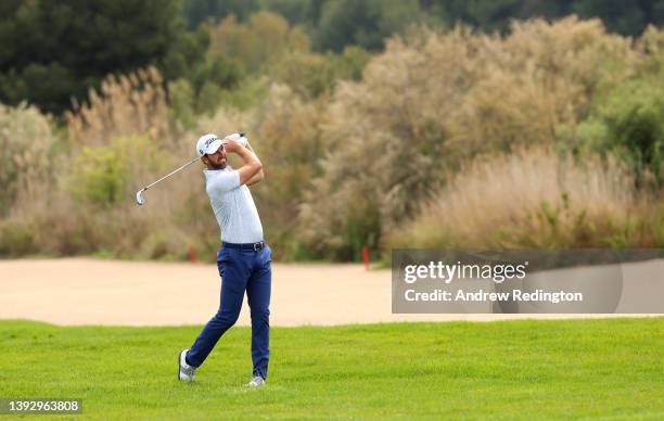 Scott Jamieson of Scotland plays his second shot on the 18th hole during the second round of the ISPS Handa Championship at Lakes Course, Infinitum...