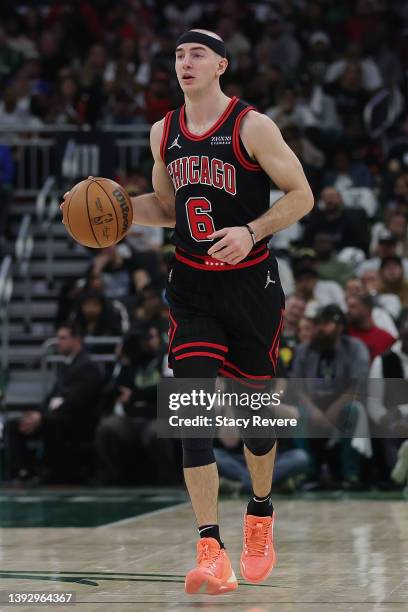 Alex Caruso of the Chicago Bulls handles the ball against the Milwaukee Bucks during Game Two of the Eastern Conference First Round Playoffs at...