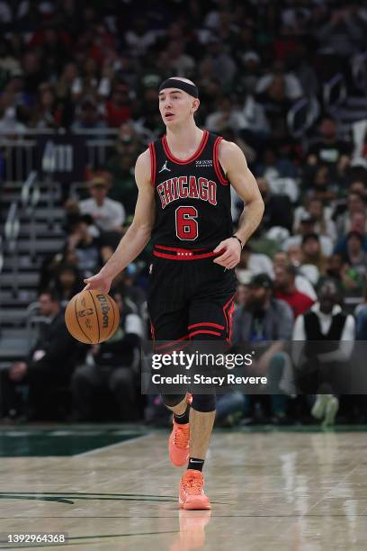 Alex Caruso of the Chicago Bulls handles the ball against the Milwaukee Bucks during Game Two of the Eastern Conference First Round Playoffs at...