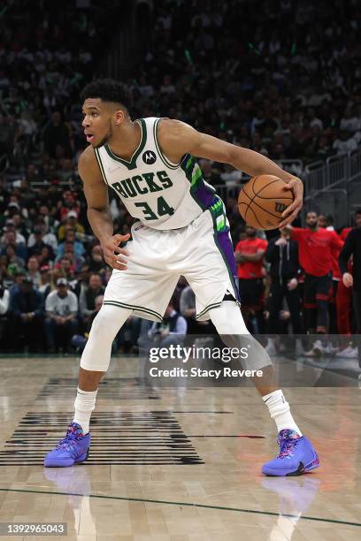Giannis Antetokounmpo of the Milwaukee Bucks handles the ball against the Chicago Bulls during Game Two of the Eastern Conference First Round...