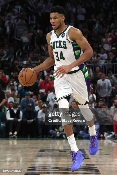 Giannis Antetokounmpo of the Milwaukee Bucks handles the ball against the Chicago Bulls during Game Two of the Eastern Conference First Round...