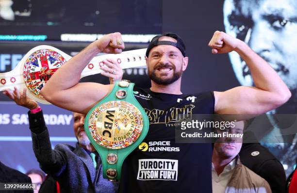 Tyson Fury of Great Britain poses with the WBC belt during the weigh-in ahead of the heavyweight boxing match between Tyson Fury and Dillian Whyte at...
