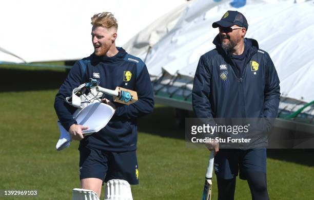 England and Durham player Ben Stokes makes his way around the boundary's edge with coach Neil Killeen after a net session during day two of the LV=...