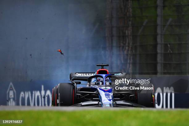 The brakes of Alexander Albon of Thailand driving the Williams FW44 Mercedes explode on track during qualifying ahead of the F1 Grand Prix of Emilia...