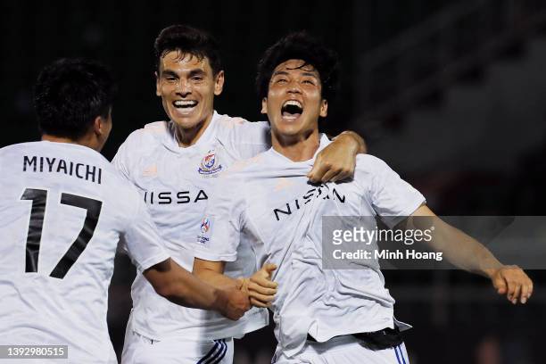 Ryotaro Tsunoda of Yokohama F. Marinos celebrates with Ryo Miyaichi and Carlos Eduardo Bendini Giusti after scoring his team's first goal against...