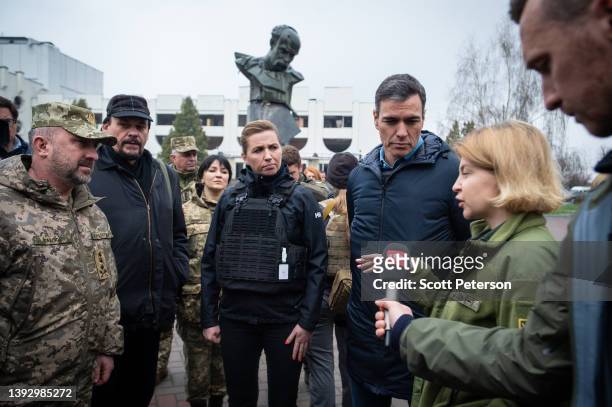 Prime Minister Mette Frederiksen of Denmark and Prime Minister Pedro Sanchez of Spain are briefed by Ukrainian officials about the destruction left...