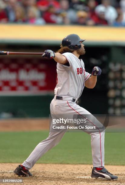 Johnny Damon of the Boston Red Sox bats against the Oakland Athletics during a Major League Baseball game on May 18, 2005 at the Oakland-Alameda...