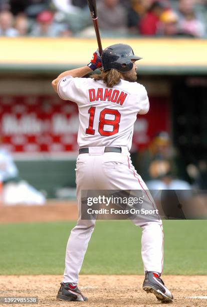 Johnny Damon of the Boston Red Sox bats against the Oakland Athletics during a Major League Baseball game on May 18, 2005 at the Oakland-Alameda...