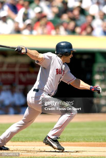 Johnny Damon of the Boston Red Sox bats against the Oakland Athletics during a Major League Baseball game on August 15, 2003 at the Oakland-Alameda...