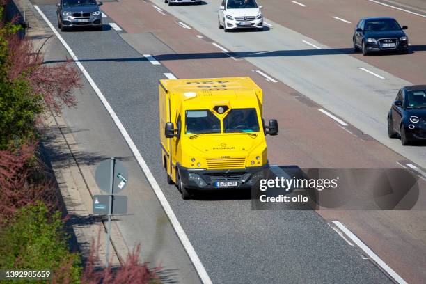 armored vehicle of prosegur on german highway a5 - prosegur stock pictures, royalty-free photos & images