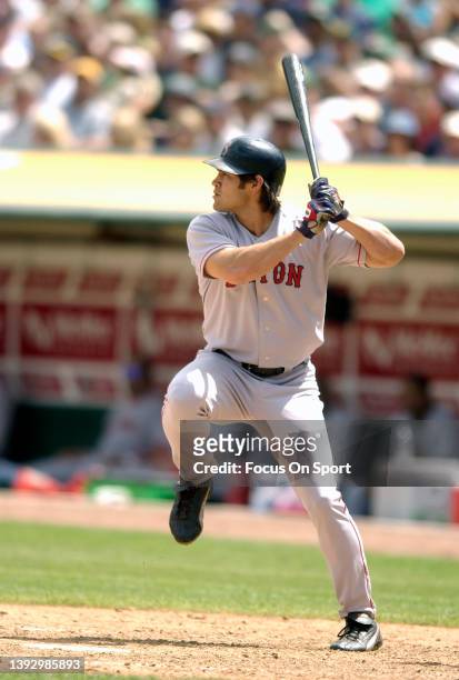 Johnny Damon of the Boston Red Sox bats against the Oakland Athletics during a Major League Baseball game on August 15, 2003 at the Oakland-Alameda...