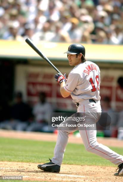 Johnny Damon of the Boston Red Sox bats against the Oakland Athletics during a Major League Baseball game on August 15, 2003 at the Oakland-Alameda...