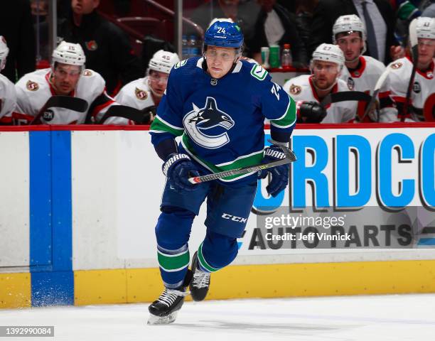 Travis Dermott of the Vancouver Canucks skates up ice during their NHL game against the Ottawa Senators at Rogers Arena April 19, 2022 in Vancouver,...