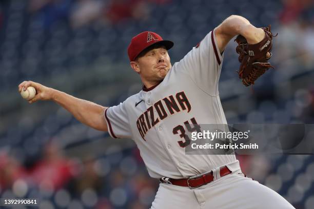Mark Melancon of the Arizona Diamondbacks pitches in the ninth inning against the Washington Nationals at Nationals Park on April 21, 2022 in...