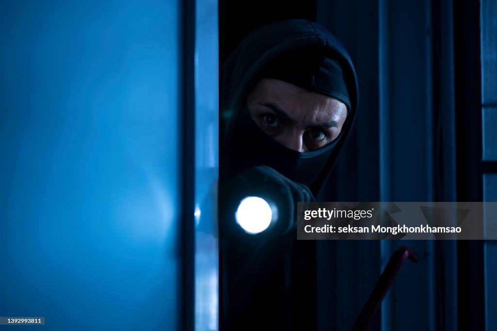 Robber Breaking In Robber Breaks House Door High-Res Stock Photo - Getty Images