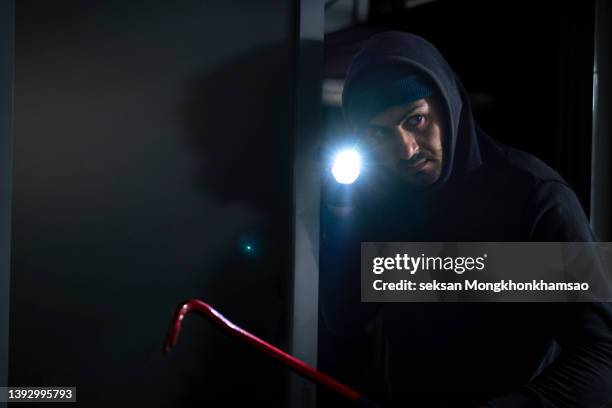 Robber Breaking In Burglar Entering Room Photos and Premium High Res Pictures - Getty Images