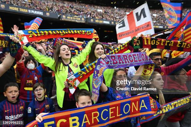 Fans show their support from the stands during the UEFA Women's Champions League Semi Final First Leg match between FC Barcelona and VfL Wolfsburg at...
