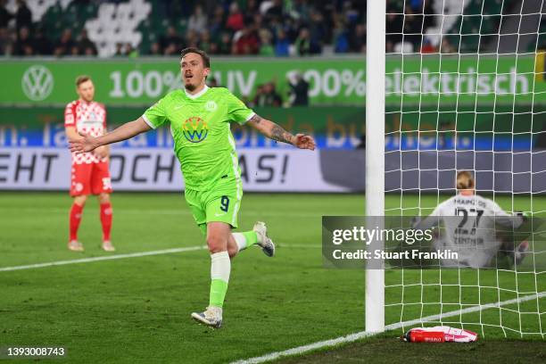 Max Kruse of VfL Wolfsburg celebrates after scoring their team's third goal during the Bundesliga match between VfL Wolfsburg and 1. FSV Mainz 05 at...