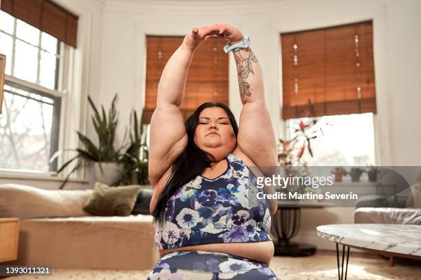lgbtq+ woman does yoga - showus stock pictures, royalty-free photos & images